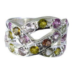 Sofia multicolor gemstone ring with various colored stones set in a silver intricate twisted band