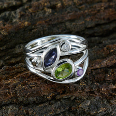 Liyana multicolor gemstone ring with green, purple, and blue stones set in silver band