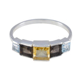 Putri multicolor gemstone ring with square yellow, dark, and light blue stones on silver band