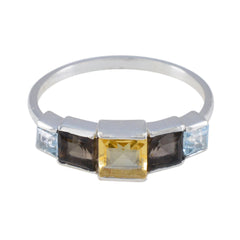 Putri multicolor gemstone ring with square yellow, dark, and light blue stones on silver band