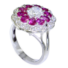 Nisa multicolor gemstone statement ring with central white round stone surrounded by pink rubies and clear halo