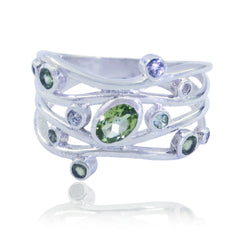 Rebeca multicolor gemstone statement ring with green and purple stones set in silver band