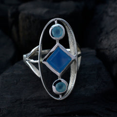 Lili multicolor gemstone trilogy ring with blue stones set in silver on black background
