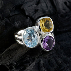 Putri multicolor gemstone trilogy ring with blue, yellow, and purple gemstones in silver setting