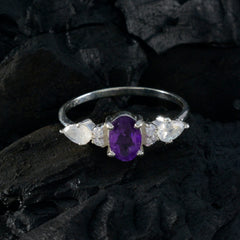 Nari multicolor gemstone trilogy ring with purple center stone and white side gemstones on silver band
