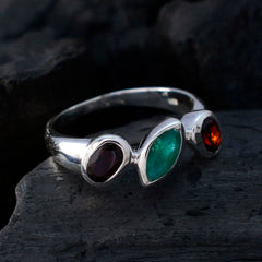 Patricia multicolor gemstone trilogy ring with red, green, and orange stones set in silver band