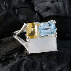 Maya multicolor gemstone trilogy ring with yellow, blue, and white stones set in silver band