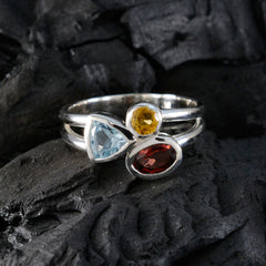 Saanvi multicolor gemstone trilogy ring in sterling silver with blue aquamarine yellow citrine and red garnet