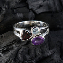 Nia sterling silver multicolor gemstone trilogy ring with red triangular light blue round and oval purple gemstones