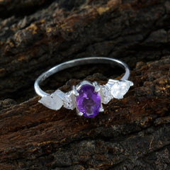Nari multicolor gemstone trilogy ring with purple center stone and clear side stones on silver band