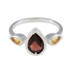 Lakshmi multicolor gemstone trilogy ring with pear-shaped red and yellow gemstones in silver setting