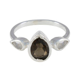 Xiu silver ring with pear shaped smoky center and two clear side stones multicolor gemstone trilogy ring