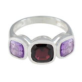 Mariana multicolor gemstone trilogy ring with purple and deep red gemstones set in silver band