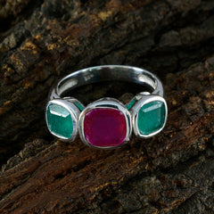 Isabella multicolor gemstone trilogy ring with one red and two green stones set in silver band