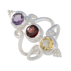 Priya multicolor gemstone trilogy ring with purple, red, and yellow stones set in silver band