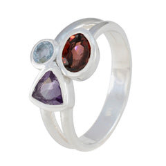 Siti multicolor gemstone trilogy ring with blue, red, and purple gemstones set in silver band