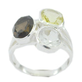 Isadora multicolor gemstone trilogy ring with three differently colored gemstones set in silver band
