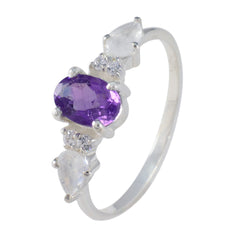Nari multicolor gemstone trilogy ring with purple oval and clear teardrop gemstones on silver band