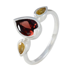 Lakshmi multicolor gemstone trilogy ring with red and yellow pear-shaped stones set in silver band