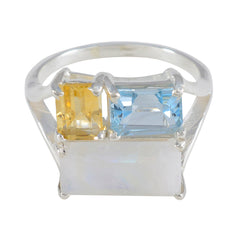 Maya multicolor gemstone trilogy ring with yellow, blue, and white rectangular gemstones set in silver band