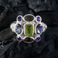 Julia multicolor Navratna cocktail ring with vibrant gemstones set in silver band