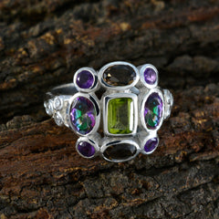 Julia multicolor Navratna cocktail ring with various colorful gemstones set in silver band