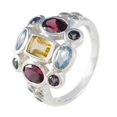 Maria multicolor Navratna cocktail ring with various oval and rectangular gemstones in silver setting