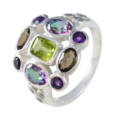 Julia multicolor Navratna cocktail ring with green, purple, and brown gemstones in silver setting