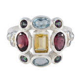 Maria multicolor Navratna cocktail ring featuring various colored gemstones set in silver
