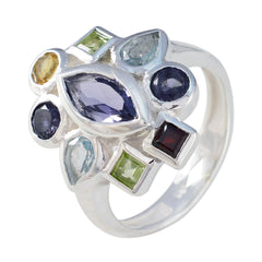 Patricia multicolor navratna gemstone ring with various vibrant gemstones set in silver band