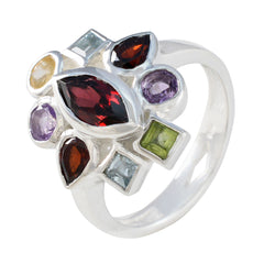 Nia multicolor navratna ring with various gemstone shapes set in silver band