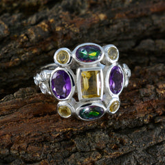Giulia silver multicolor Navratna ring with central yellow gemstone surrounded by amethyst and green stones