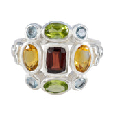 Julieta sterling silver multicolor navratna ring with central deep red stone and peridot citrine aquamarine accents