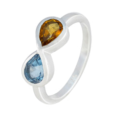 Jia multicolor toi et moi ring with blue and amber teardrop gemstones set in silver band