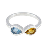Jia multicolor toi et moi ring with blue and yellow gemstones set in silver band