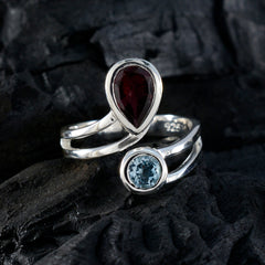 Isabelle multicolor toi et moi ring with red teardrop and blue round gemstones set in silver band