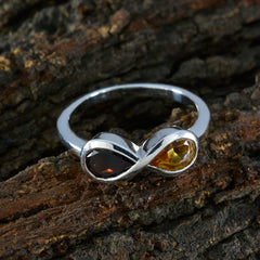 Hye jin sterling silver multicolor toi et moi ring with garnet red and citrine yellow teardrop stones on wood