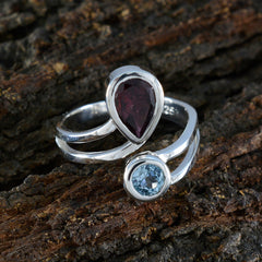 Isabelle silver multicolor toi et moi ring featuring pear-shaped red and round blue gemstones