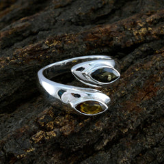 Eleanor silver multicolor toi et moi ring with two marquise gemstones on textured dark wood