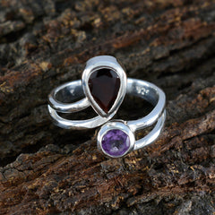 Florencia multicolor toi et moi ring with pear-shaped red and round purple gemstones on silver band