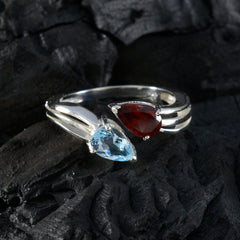 Freya multicolor toi et moi ring silver band with pear shaped blue topaz and red garnet stones