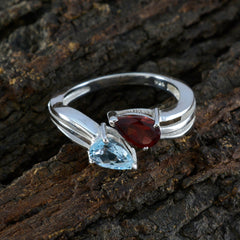 Freya multicolor toi et moi ring with pear shaped aquamarine blue and garnet red stones in silver band