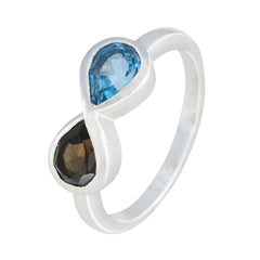 Victoria multicolor toi et moi ring with blue and brown pear-shaped gemstones in silver band