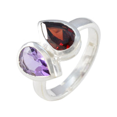 Pauline multicolor toi et moi ring featuring pear-shaped red and purple gemstones on silver band