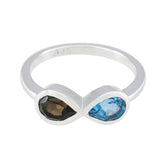 Victoria multicolor toi et moi ring with blue and brown gemstones set in silver band
