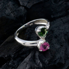 Nisa sterling silver multicolor toi et moi ring with heart shaped green and pink gemstones on black background