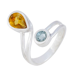 Isla multicolor Toi et Moi ring with pear-shaped yellow and round blue gemstones in silver band