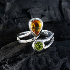 Isabella multicolor toi et moi ring with pear-shaped amber and round green stones on silver band