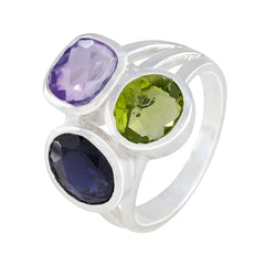 Dayana multicolor trilogy cocktail ring featuring amethyst peridot and iolite in sterling silver band