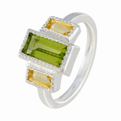 Elena sterling silver multicolor trilogy gemstone ring featuring a rectangular green center stone and two yellow baguette stones